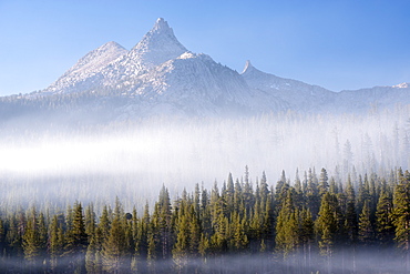 Mist surrounding the forest below Unicorn Peak in autumn, Yosemite National Park, UNESCO World Heritage Site, California, United States of America, North America