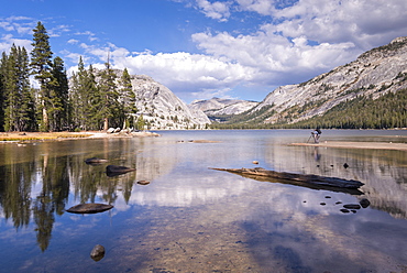 Photographer at Tenaya Lake in Yosemite National Park, UNESCO World Heritage Site, California, United States of America, North America