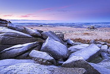 Frost covered granite boulders in winter at Great Staple Tor in Dartmoor National Park, Devon, England, United Kingdom, Europe