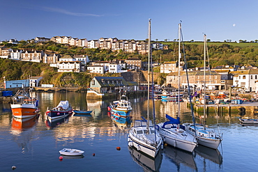 Fishing boats and yachts moored in Mevagissey harbour, Cornwall, England, United Kingdom, Europe