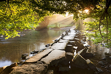 Tarr Steps clapper bridge crossing the River Barle, Exmoor National Park, Somerset, England, United Kingdom, Europe