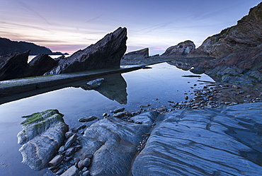 Dusk over Combe Martin beach in Exmoor National Park, Devon, England, United Kingdom, Europe