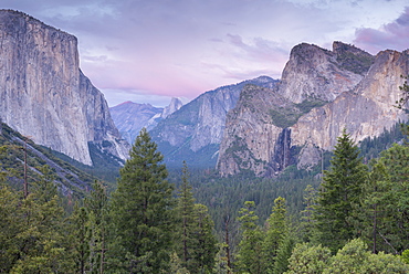 Yosemite Valley beneath pink twilight skies, Yosemite National Park, UNESCO World Heritage Site, California, United States of America, North America