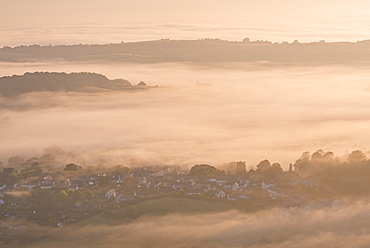 Chagford Church and village surrounded by early morning mist, Dartmoor National Park, Devon, England, United Kingdom, Europe