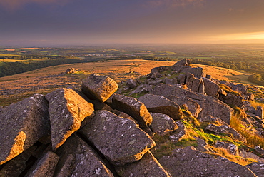 Magical light illuminating Belstone Tor in Dartmoor, Devon, England, United Kingdom, Europe