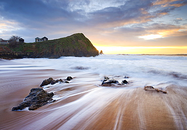 Incoming waves at sunset, Hope Cove, South Hams, Devon, England, United Kingdom, Europe