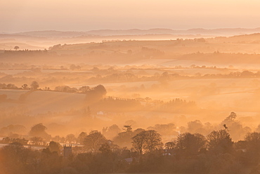 Throwleigh Church and mist covered landscape at dawn, Dartmoor, Devon, England, United Kingdom, Europe