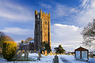 St Mary's church, bathed in afternoon sunshine on a snowy winter afternoon, Morchard Bishop, Devon, England, United Kingdom, Europe