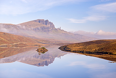 The Storr reflected in the tranquil water of Loch Fada, Isle of Skye, Inner Hebrides, Scotland, United Kingdom, Europe