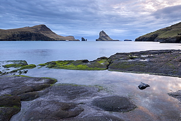 View towards Tindholmur from the rocky shores of Bour, Vagar, Faroe Islands, Denmark, Europe