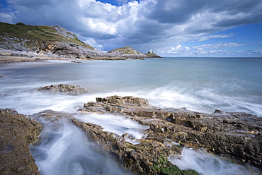 Mumbles lighthouse from Bracelet Bay, Gower Peninsula, Swansea, Wales, United Kingdom, Europe