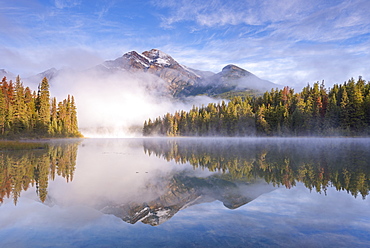 Mist obscures Pyramid Mountain, reflected in Pyramid Lake, Jasper National Park, UNESCO World Heritage Site, Canadian Rockies, Alberta, Canada, North America