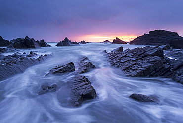 Sunset over the dramatic coastline of Hartland Quay, North Devon, England, United Kingdom, Europe