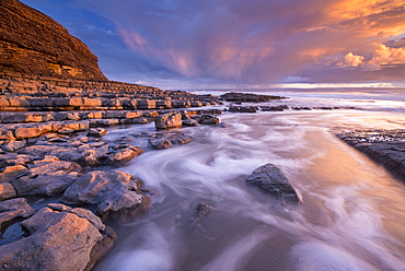 Spectacular sunset over Nash Point on the Glamorgan Heritage Coast, South Wales, United Kingdom, Europe