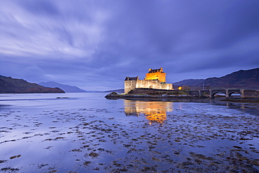 Twilight over Eilean Donan Castle on Loch Duich, Dornie, Highlands, Scotland, United Kingdom, Europe