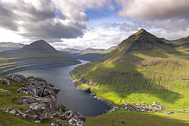 Village of Funningur on the shores of Funningsfjordur in the Faroe Islands, Denmark, Europe