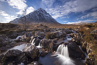 Cascades on the River Coupall with a snow dusted Buachaille Etive Mor mountain in the background, Glen Etive, Highlands, Scotland, United Kingdom, Europe