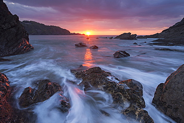 Sunset over the rugged shores of Combe Martin on the edge of Exmoor National Park, Devon, England, United Kingdom, Europe