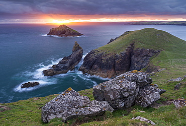 Sunrise over The Rumps near Pentire Head on the north coast of Cornwall, England, United Kingdom, Europe