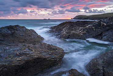 Pink sunset sky above Trevose Head and Booby's Bay, Cornwall, England, United Kingdom, Europe