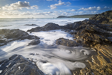 Waves swirl around the rocks of Booby's Bay near Trevose Head, Cornwall, England, United Kingdom, Europe