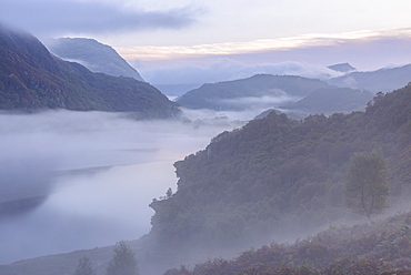 Mist shrouds Llyn Dinas at dawn in Snowdonia National Park, Wales, United Kingdom, Europe