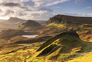 Morning sunlight on the Trotternish Mountains from the Quiraing, Isle of Skye, Inner Hebrides, Scotland, United Kingdom, Europe