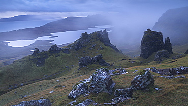 Jagged basalt peaks near the Old Man of Storr on a foggy autumn morning, Isle of Skye, Inner Hebrides, Scotland, United Kingdom, Europe