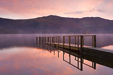 Sunrise over Derwent Water from Hawes End jetty in autumn, Lake District National Park, Cumbria, England, United Kingdom, Europe