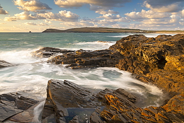 Rocky shoreline of Treyarnon Point at sunset, looking towards Trevose Head, Cornwall, England, United Kingdom, Europe