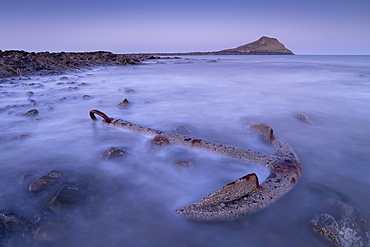 Rusted anchor from a shipwreck near Worm's Head on the Gower, Wales, United Kingdom, Europe