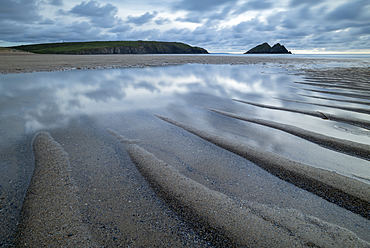 Tidal pools on the sandy beach at Holywell Bay, Cornwall, England, United Kingdom, Europe