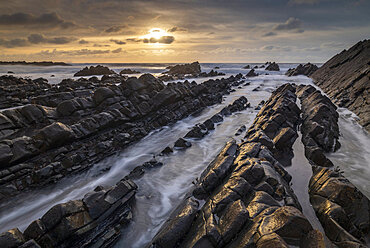 Sunset in winter over the North Devon coast, Devon, England, United Kingdom, Europe