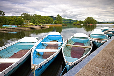 Pleasure boats moored at Llangorse Lake, Brecon Beacons National Park, Powys, Wales, United Kingdom, Europe