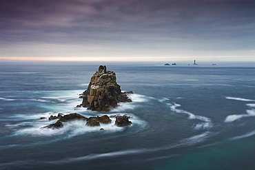 The Armed Knight rock stack and Longships Lighthouse off the coast at Land's End, Cornwall, England, United Kingdom, Europe