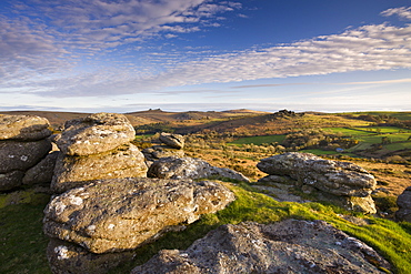 Granite outcrop at Hayne Down, looking over moorland towards Hound Tor and Haytor, Dartmoor National Park, Devon, England, United Kingdom, Europe