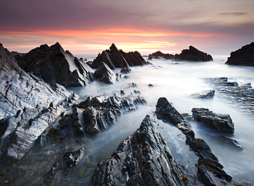 Dramatic coastal scenery at sunset, Hartland Quay, North Devon, England, United Kingdom, Europe