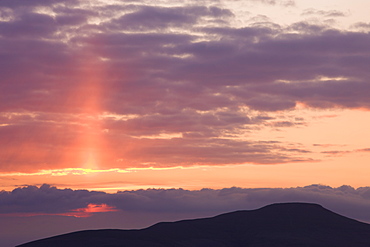 Early morning sky above Sugarloaf Mountain glows with the impending sunrise, Brecon Beacons National Park, Powys, Wales, United Kingdom, Europe