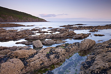 Twilight over Hemmick Beach, looking towards Gell Point, Boswinger, Cornwall, England, United Kingdom, Europe