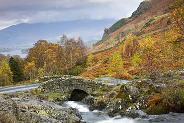 Barrow Beck flows beneath the picturesque Ashness Bridge, Lake District National Park, Cumbria, England, United Kingdom, Europe