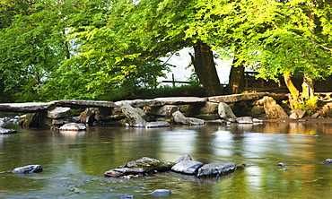 Tarr Steps, an ancient clapper bridge in Exmoor National Park, Somerset, England, United Kingdom, Europe