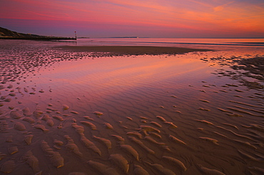 Shallow pools of water on Bournemouth Beach isolated from the receding tide, Bournemouth, Dorset, England, United Kingdom, Europe