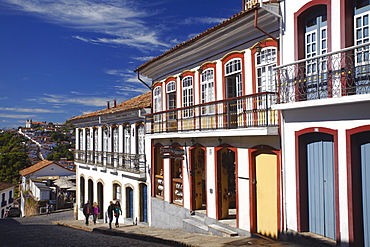 People walking along street, Ouro Preto, UNESCO World Heritage Site, Minas Gerais, Brazil, South America 