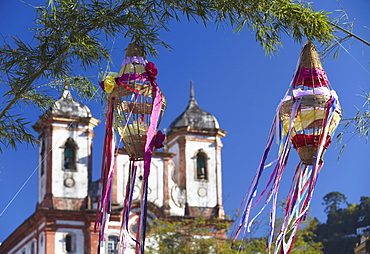 Decorations for festival with Our Lady of Conceicao de Antonio Dias Church in background, Ouro Preto, UNESCO World Heritage Site, Minas Gerais, Brazil, South America 