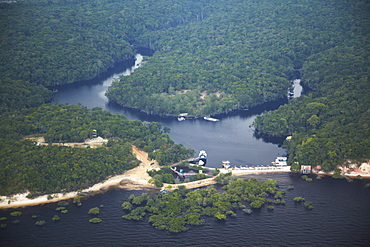 Aerial view of Amazon rainforest and beach resort along the Rio Negro, Manaus, Amazonas, Brazil, South America 