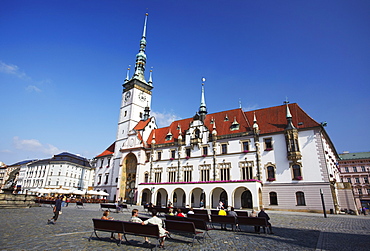 People relaxing in front of Town Hall in Upper Square (Horni Namesti), Olomouc, Moravia, Czech Republic, Europe