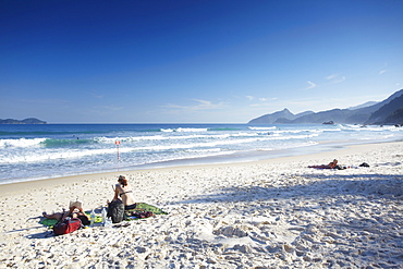 People sunbathing on Lopes Mendes beach, Ilha Grande, Rio de Janeiro State, Brazil, South America