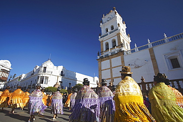 Women dancing in festival in Plaza 25 de Mayo, Sucre, UNESCO World Heritage Site, Bolivia, South America