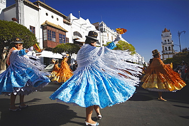 Women dancing in festival in Plaza 25 de Mayo, Sucre, UNESCO World Heritage Site, Bolivia, South America