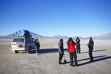 Tourists and jeep on Altiplano, Potosi Department, Bolivia, South America